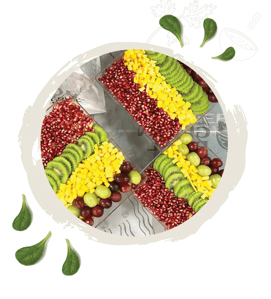 Rainbow fruit platter with berries, kiwi and pineapple