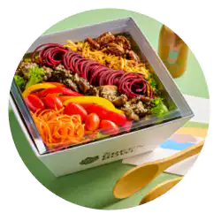 Gourmet salad box with roasted vegetables and fruit